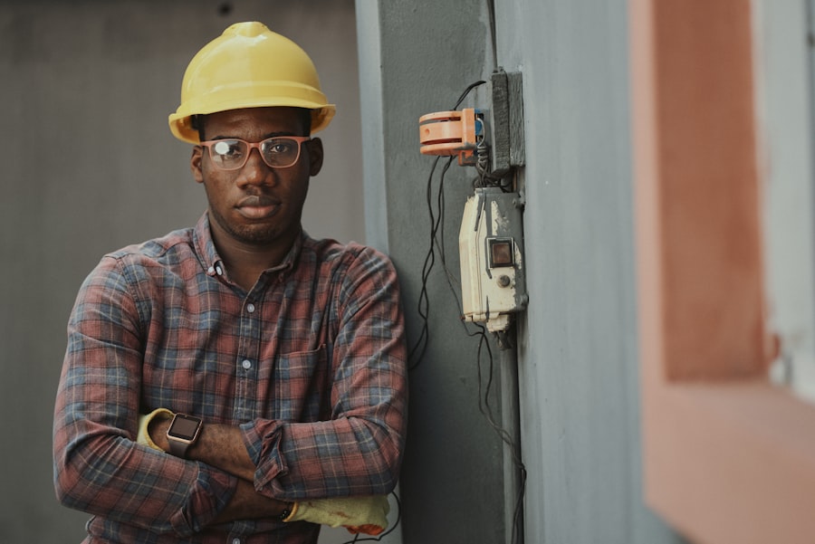 Electrician working on electrical equipment